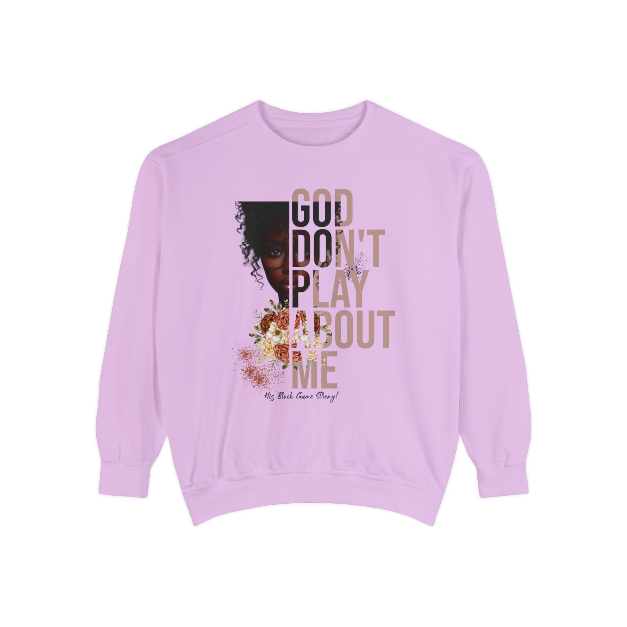 Flatlay mockup of women's orchid color sweatshirt with design that reads "God Don't Play About Me - His Block Game Strong" and dark skin lady graphic