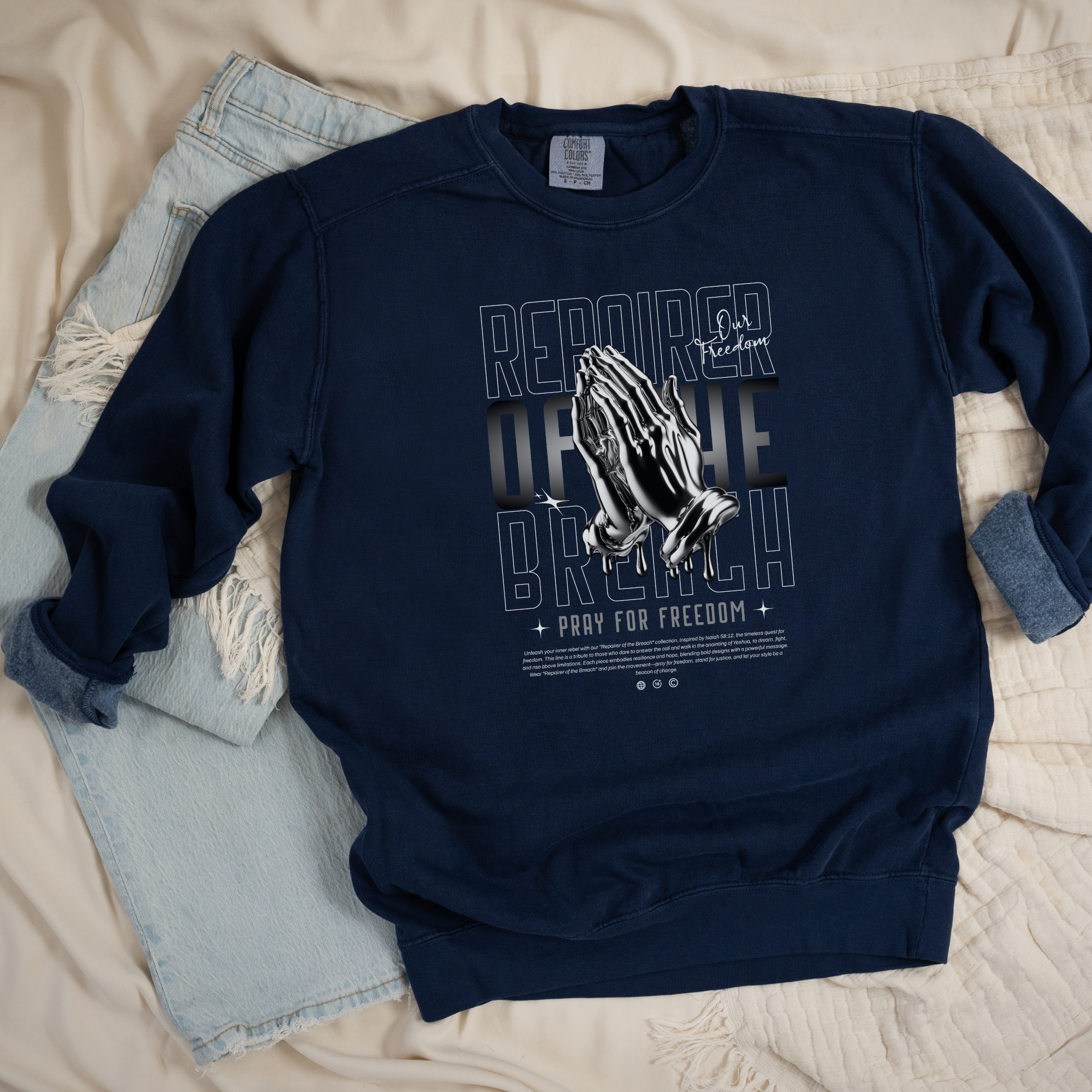 repairer of the breach design, inspired by Isaiah 58:12 bible verse, on a true navy luxurious 100% cotton sweatshirt, unisex