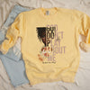 Flatlay mockup of women's butter color sweatshirt with design that reads 