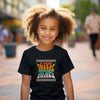 girl model wearing a black youth t-shirt with design that reads 