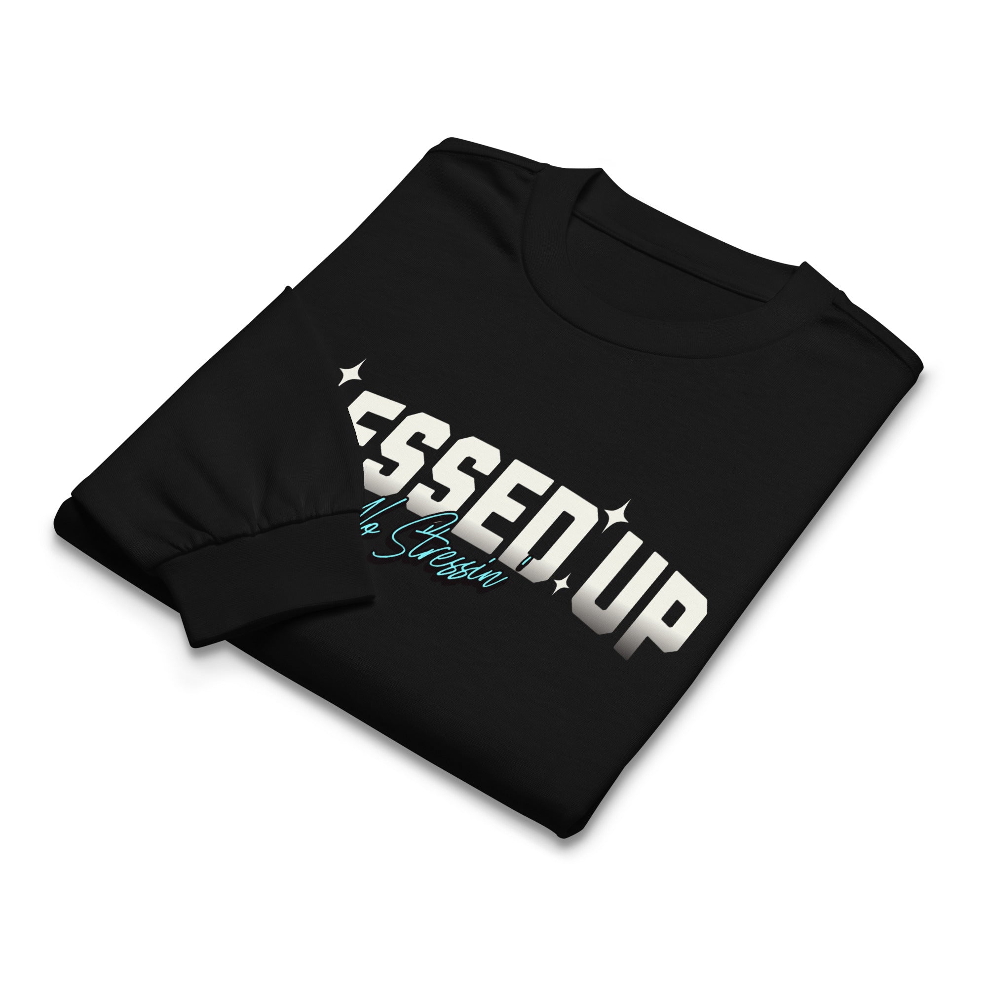 Folded premium black heavyweight sweatshirt with text design saying Blessed Up No Stressin" across front chest area, also with intricate bible verse design on left and right sleeve